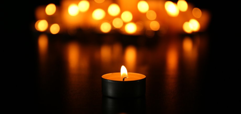 Burning candles on dark background Burning candles on dark background