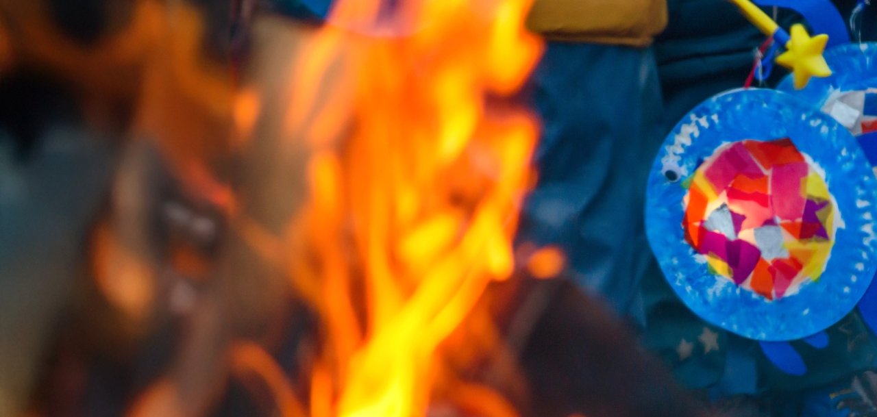 sankt martin day, bonfire and children with lantern defocused