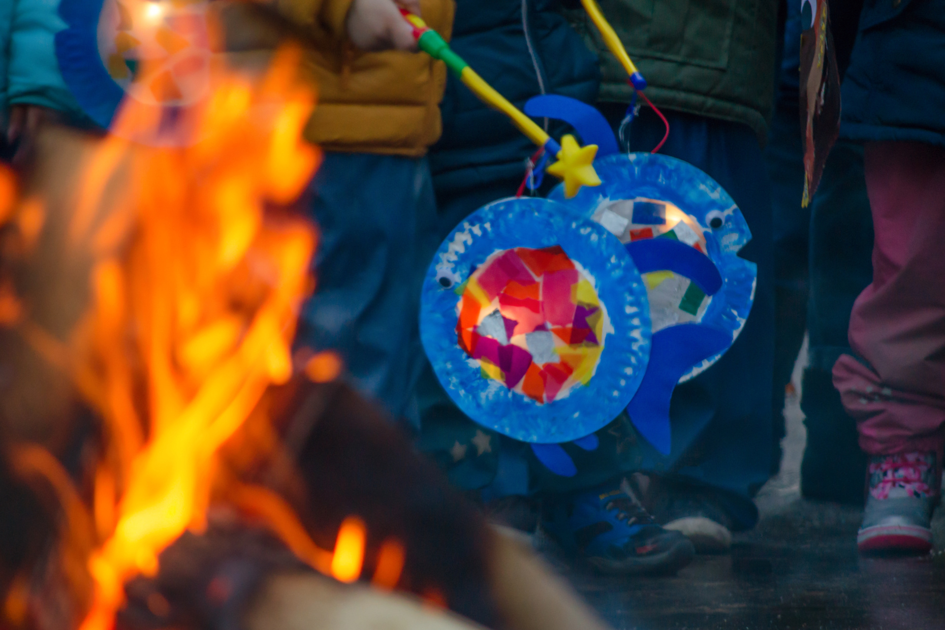 sankt martin day, bonfire and children with lantern defocused